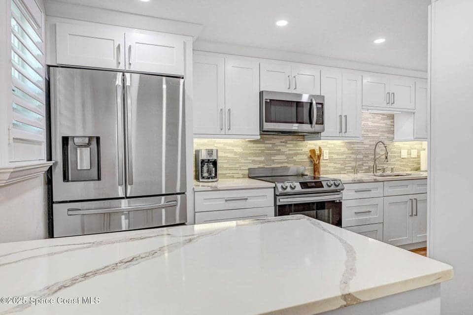 500 Palm Springs Boulevard 408, Indian Harbour Beach, FL 32937 photo 5