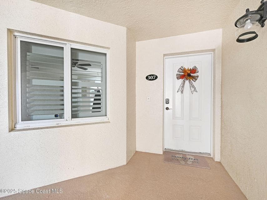 123 Lancha Circle 307, Satellite Beach, FL 32937 photo 3
