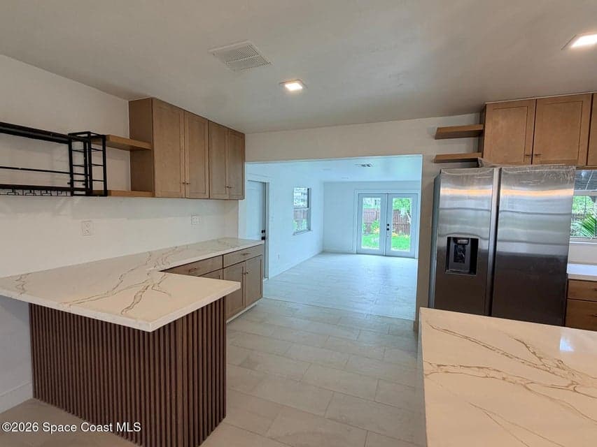 205 Melaleuca Drive E, Satellite Beach, FL 32937 photo 5