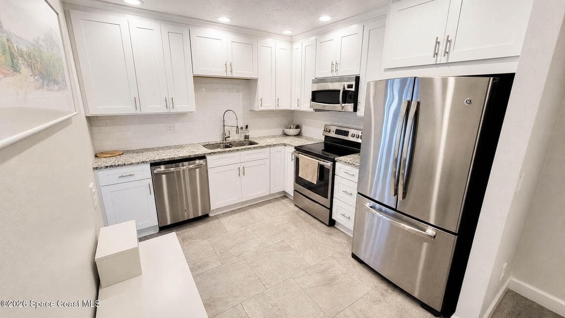 1020 Ashley Avenue, Indian Harbour Beach, FL 32937 photo 2