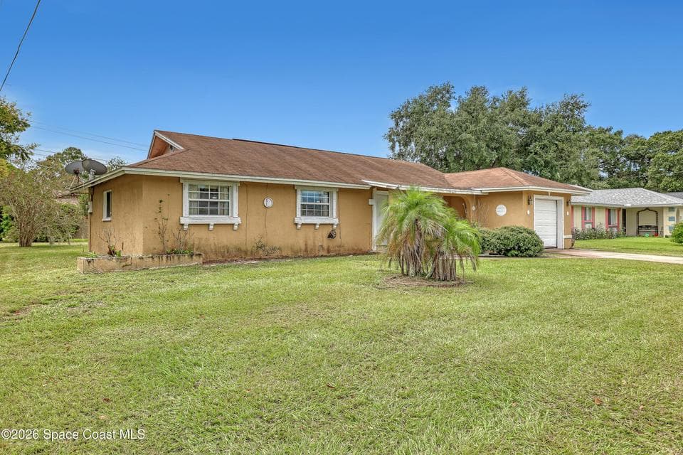 1115 Tarpon Drive, Rockledge, FL 32955 photo 3
