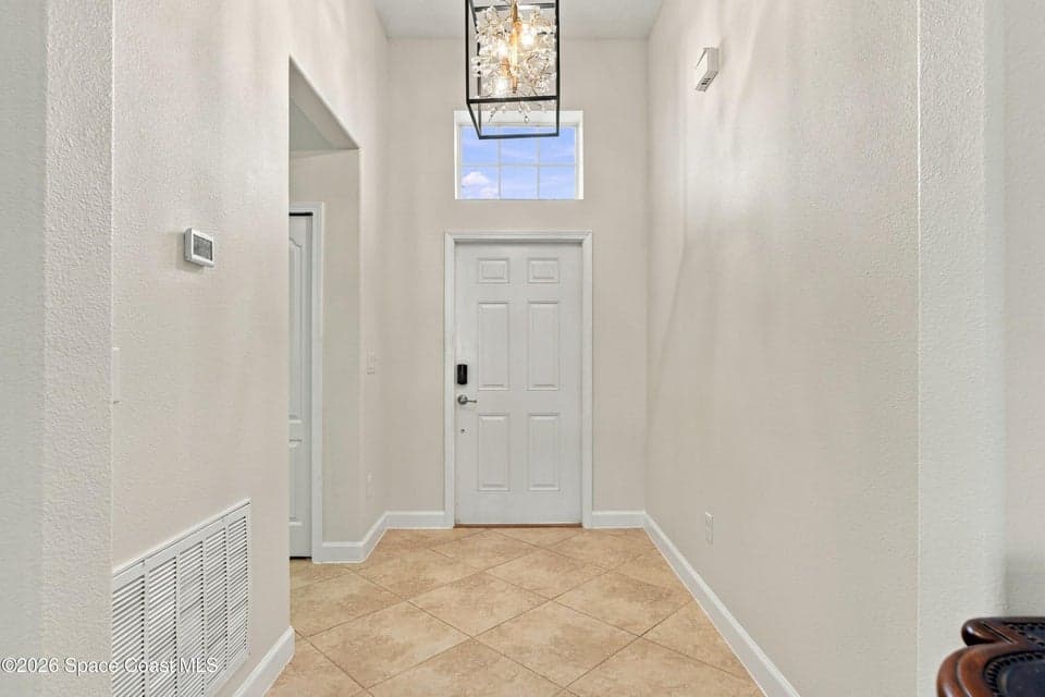 Home for sale at 6059 Van Ness Drive, Melbourne, FL 32940 – 4 bed, 3 bath, photo 5