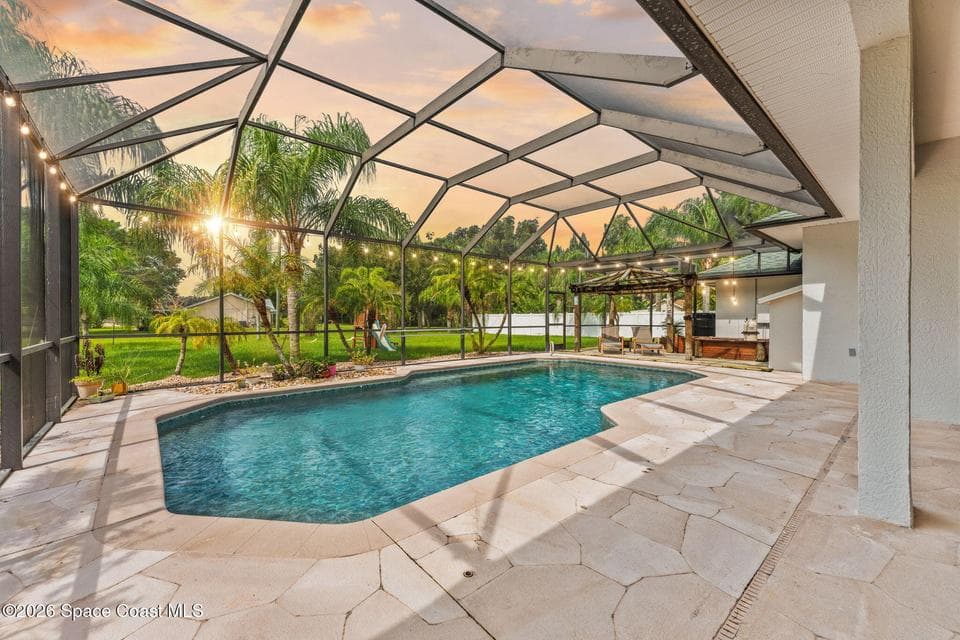 Home for sale at 3410 Brahman Avenue, Rockledge, FL 32955 – 4 bed, 2 bath, photo 5