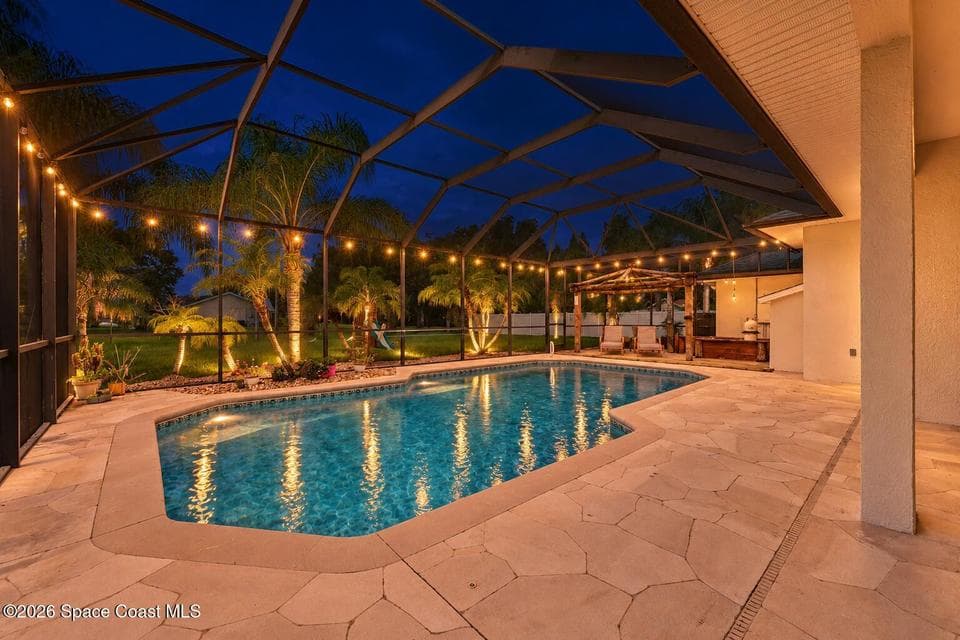 Home for sale at 3410 Brahman Avenue, Rockledge, FL 32955 – 4 bed, 2 bath, photo 2