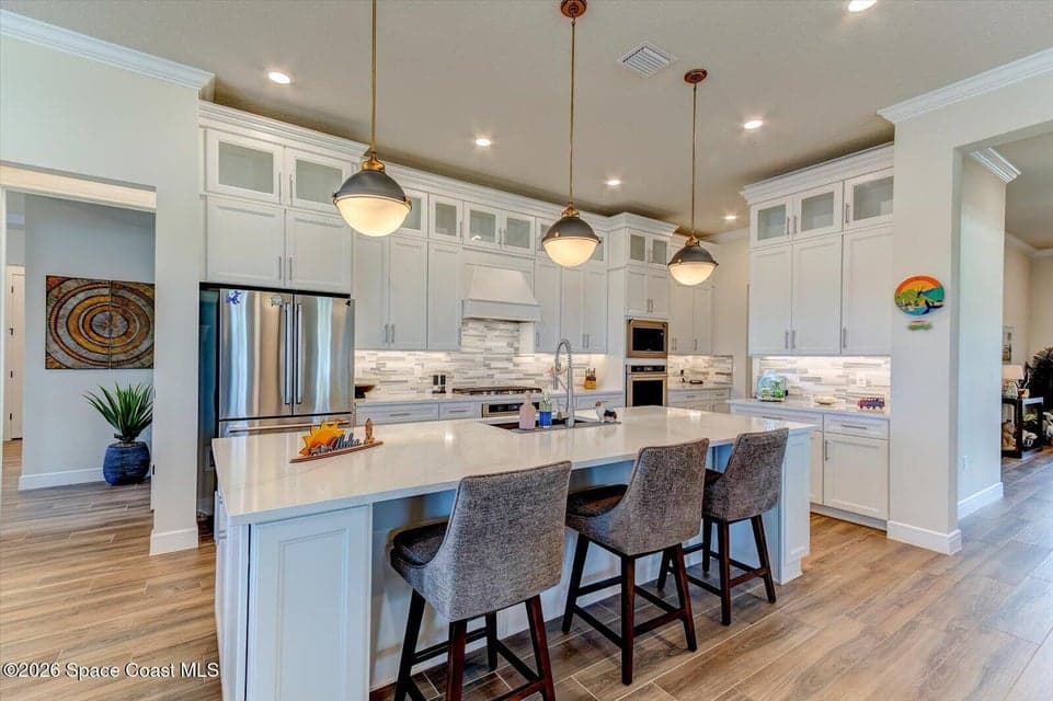 Home for sale at 9177 Splashing Drive, Melbourne, FL 32940 – 3 bed, 4 bath, photo 4
