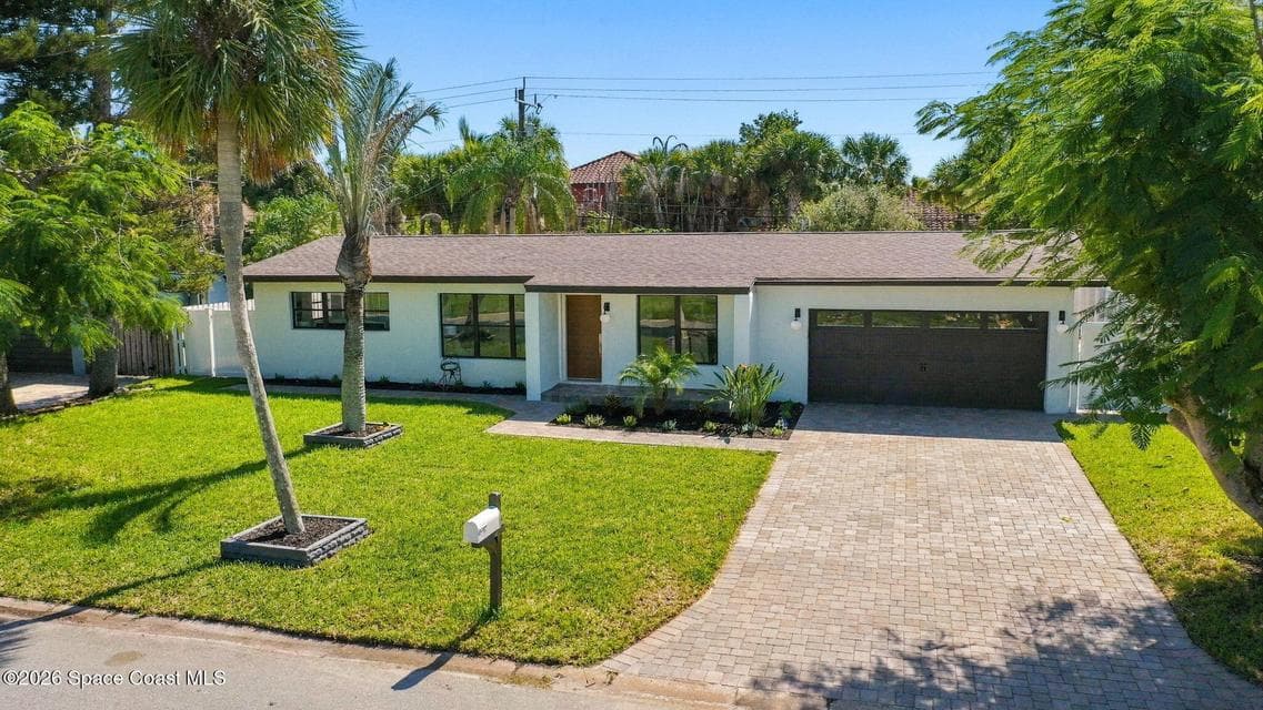 Home for sale at 356 W Exeter Street, Satellite Beach, FL 32937 – 3 bed, 2 bath