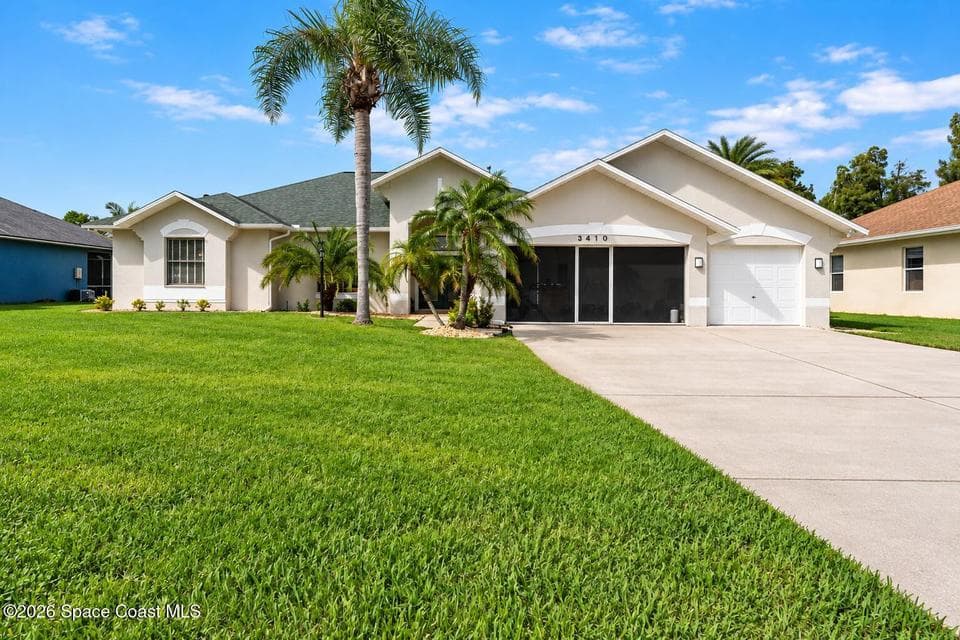 Home for sale at 3410 Brahman Avenue, Rockledge, FL 32955 – 4 bed, 2 bath, photo 3