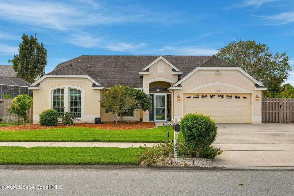 Home for sale at 1493 Stafford Avenue, Merritt Island, FL 32952 – 3 bed, 2 bath, photo 2