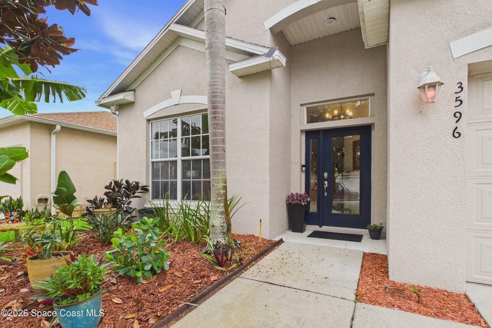Home for sale at 3596 Hoofprint Drive, Melbourne, FL 32940 – 4 bed, 2 bath, photo 2