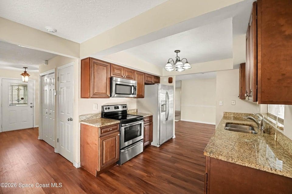 Home for sale at 75 Artemis Boulevard, Merritt Island, FL 32953 – 3 bed, 2 bath, photo 6