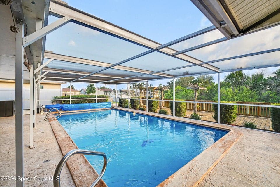 Home for sale at 75 Artemis Boulevard, Merritt Island, FL 32953 – 3 bed, 2 bath, photo 2