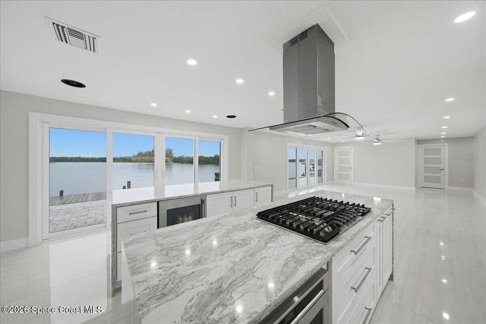 Home for sale at 415 Island Drive, Merritt Island, FL 32952 – 4 bed, 4 bath, photo 6
