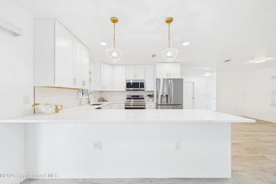 Home for sale at 330 Eutau Court, Indian Harbour Beach, FL 32937 – 4 bed, 2 bath, photo 6
