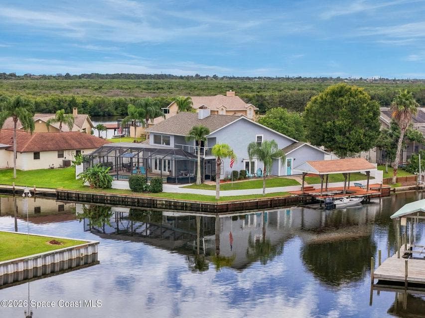 Home for sale at 1585 Sykes Creek Drive, Merritt Island, FL 32953 – 3 bed, 3 bath, photo 4