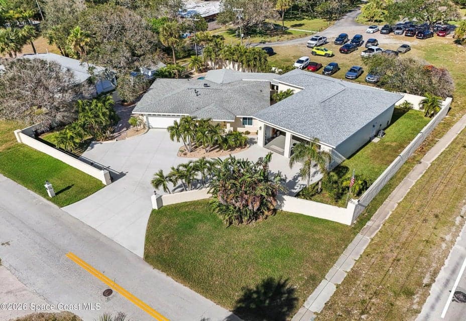 Home for sale at 104 W Alachua Lane, Cocoa Beach, FL 32931 – 3 bed, 2 bath, photo 2