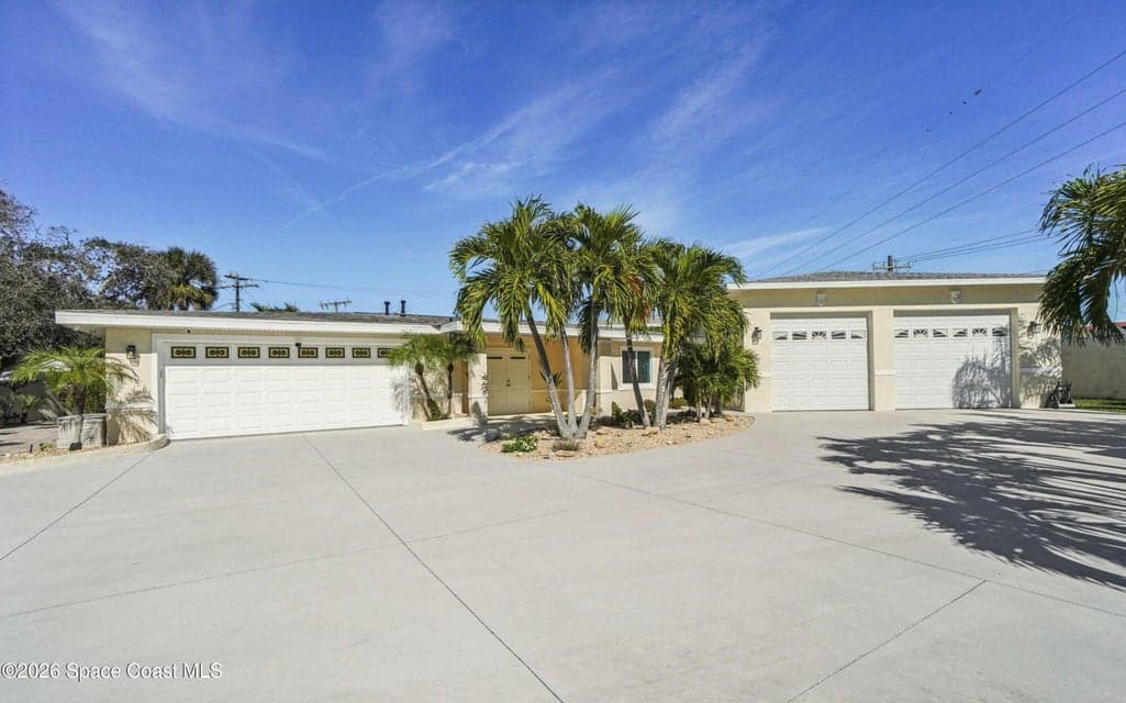 Home for sale at 104 W Alachua Lane, Cocoa Beach, FL 32931 – 3 bed, 2 bath