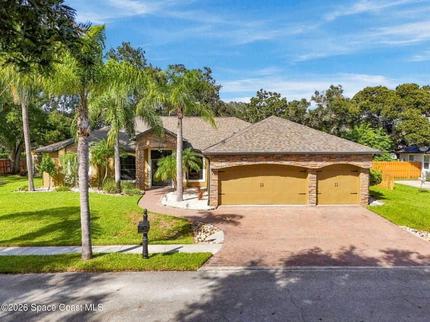 Home for sale at 1202 Curry Dell Lane, Merritt Island, FL 32952 – 4 bed, 3 bath