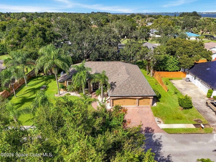 Home for sale at 1202 Curry Dell Lane, Merritt Island, FL 32952 – 4 bed, 3 bath, photo 2