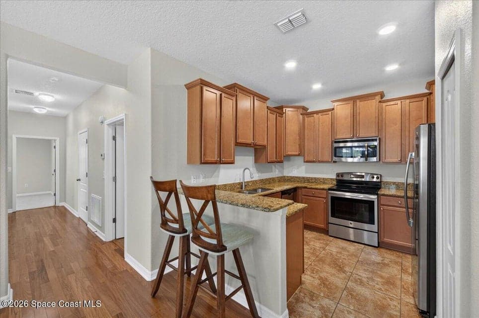 Condo for sale at 7242 Halleck Street, Melbourne, FL 32940 – 3 bed, 2 bath, photo 3