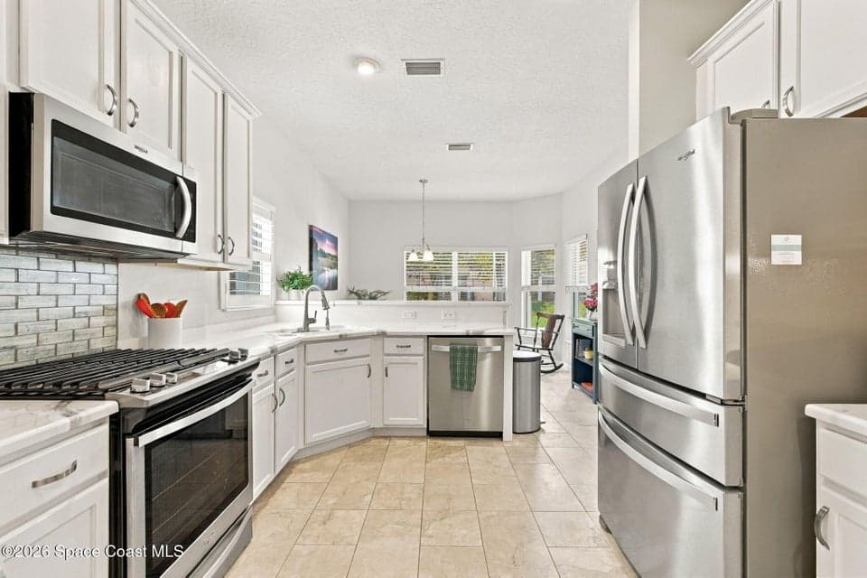 Home for sale at 3482 Carambola Circle, Melbourne, FL 32940 – 3 bed, 2 bath, photo 3
