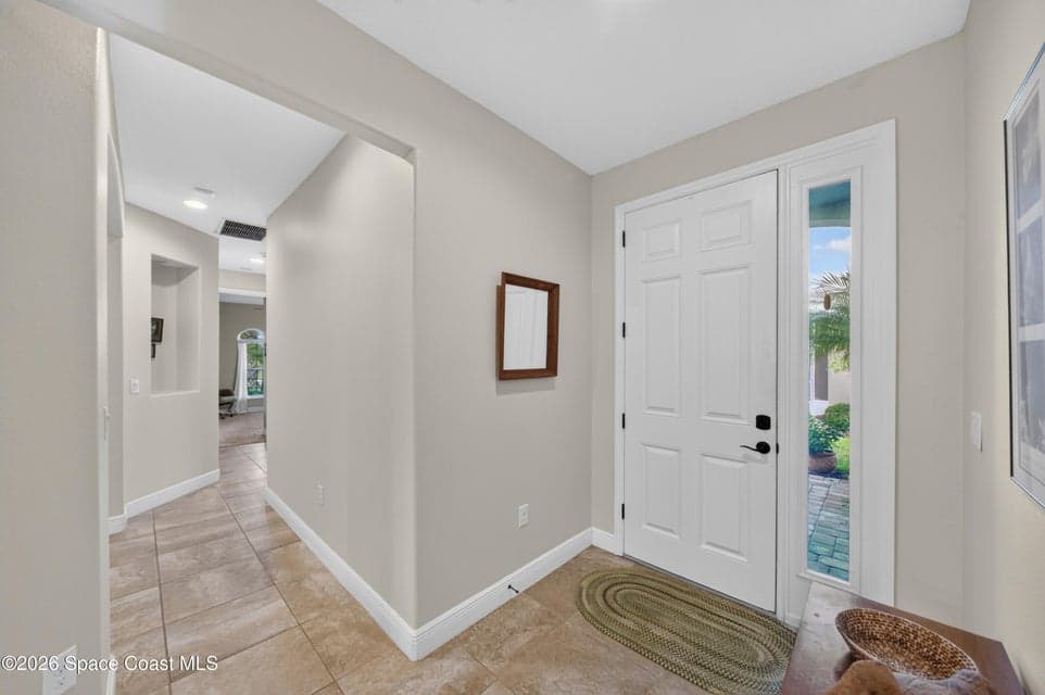 Home for sale at 7833 Loren Cove Drive, Melbourne, FL 32940 – 3 bed, 2 bath, photo 4