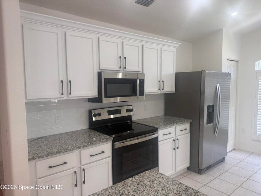 Home for sale at 4850 Erin Lane, Melbourne, FL 32940 – 3 bed, 2 bath, photo 4