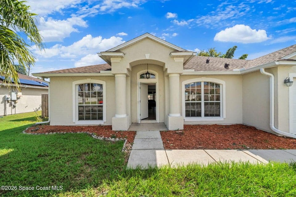 Home for sale at 969 Sabal Grove Drive, Rockledge, FL 32955 – 4 bed, 2 bath, photo 3
