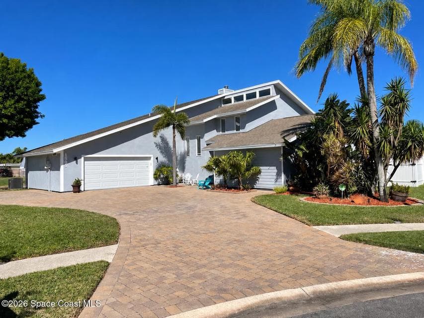 Home for sale at 1585 Sykes Creek Drive, Merritt Island, FL 32953 – 3 bed, 3 bath