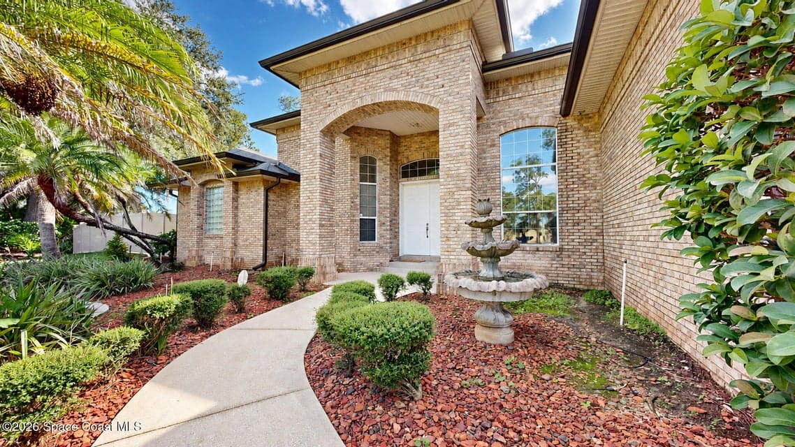 Home for sale at 3601 Carriage Gate Drive, Melbourne, FL 32904 – 4 bed, 3 bath, photo 2