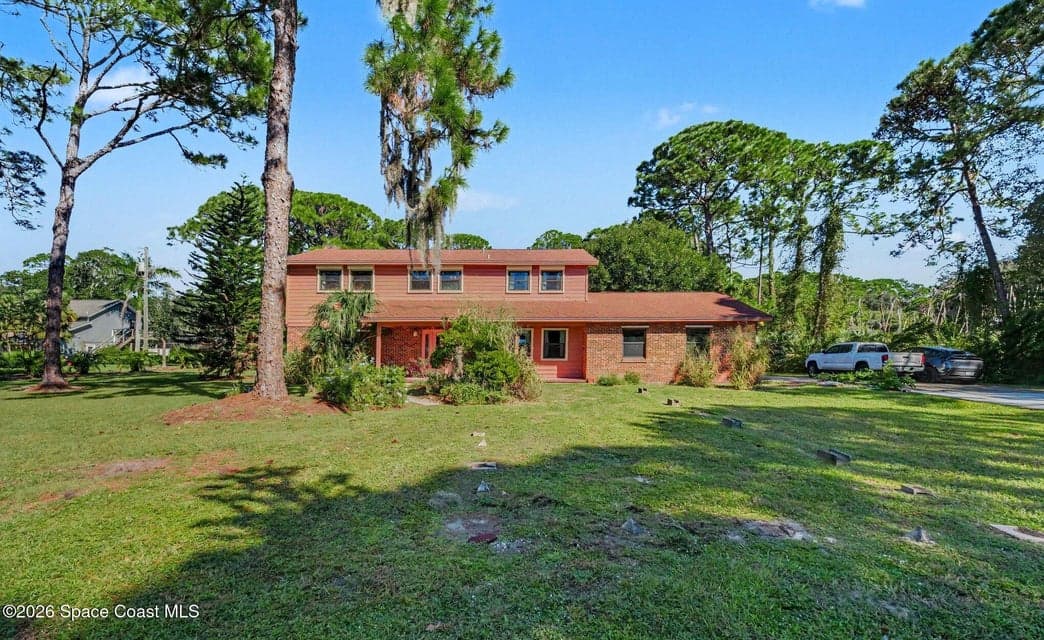 Home for sale at 580 Chase Hammock Road, Merritt Island, FL 32953 – 4 bed, 3 bath, photo 2