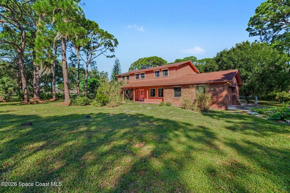 Home for sale at 580 Chase Hammock Road, Merritt Island, FL 32953 – 4 bed, 3 bath, photo 3