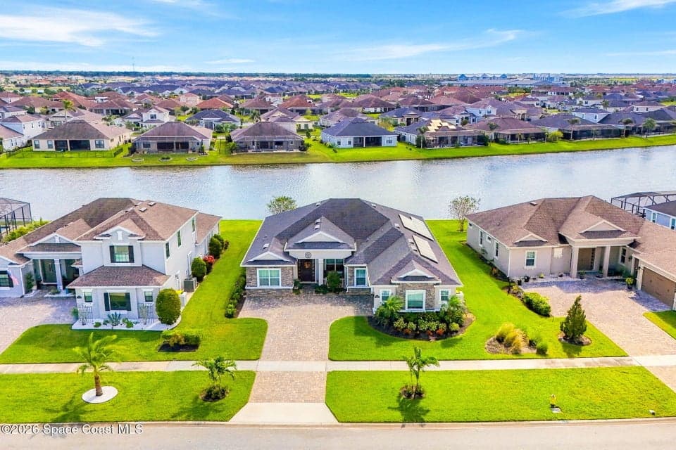 Home for sale at 8161 Paragrass Avenue, Melbourne, FL 32940 – 4 bed, 3 bath, photo 2