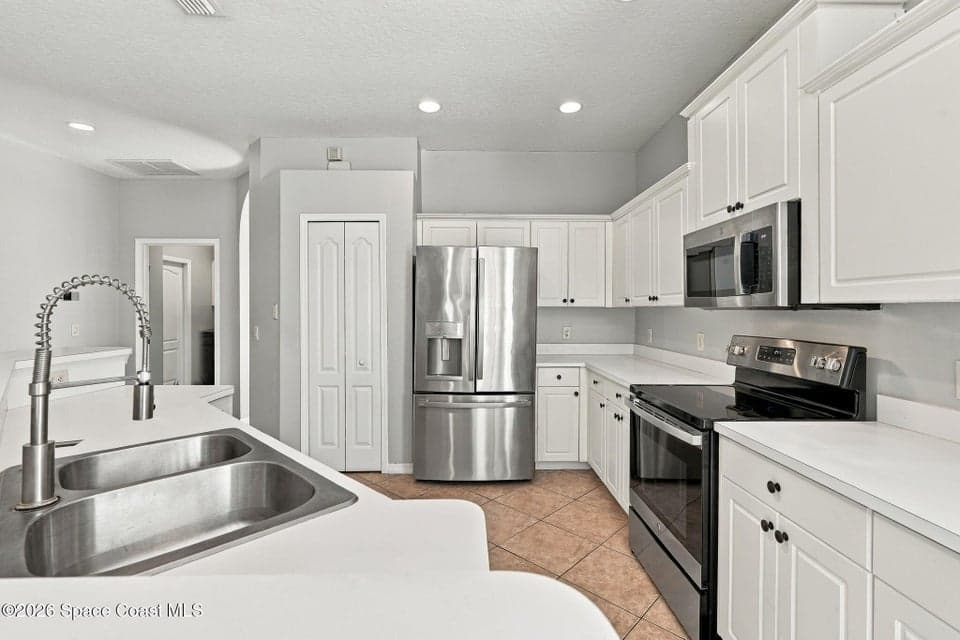 Home for sale at 660 Misty Creek Drive, Melbourne, FL 32940 – 3 bed, 2 bath, photo 2