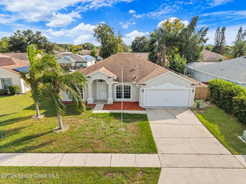 Home for sale at 969 Sabal Grove Drive, Rockledge, FL 32955 – 4 bed, 2 bath